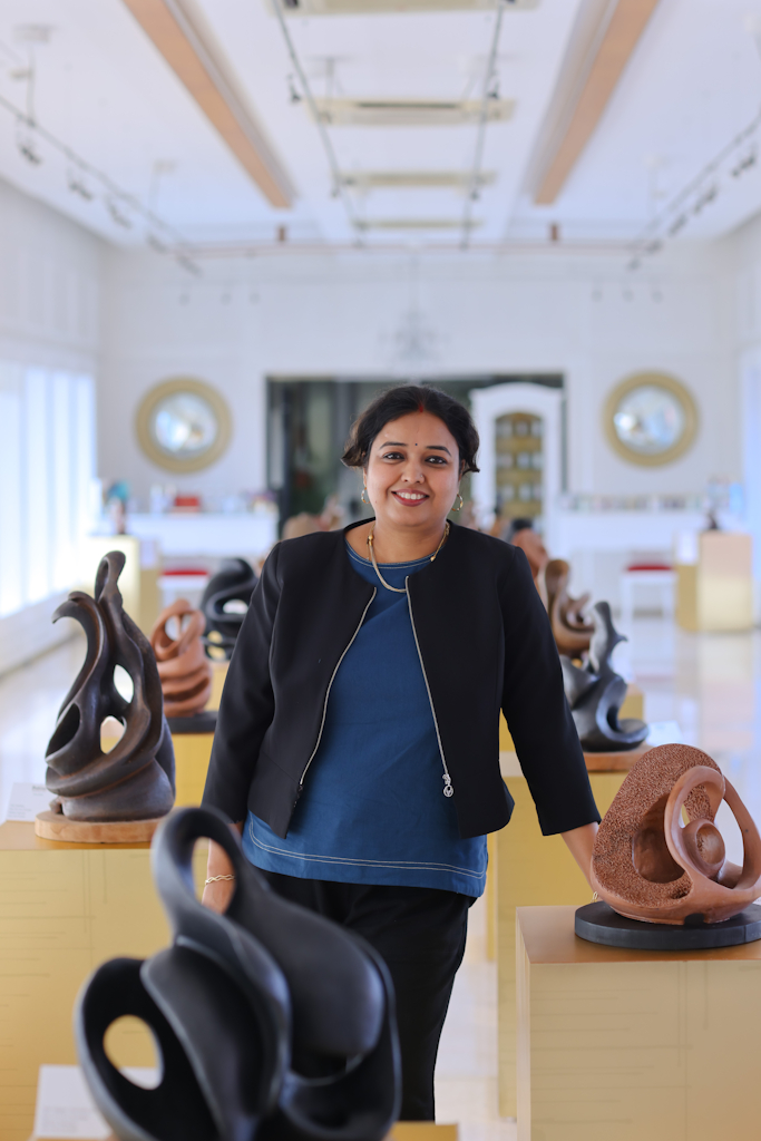 Aarti Gupta Bhadauria terracotta artwork placeholder beneath the about heading